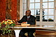 Signing the visitors' book: The President of Mozambique H. E. Armando Emílio Guebuza