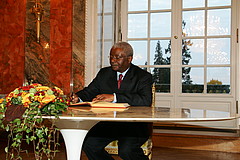 Signing the visitors' book: The President of Mozambique H. E. Armando Emílio Guebuza